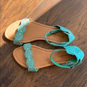 Teal Francesca’s flats/sandals